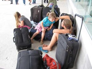 Waiting at the airport with the bulk of our possessions.